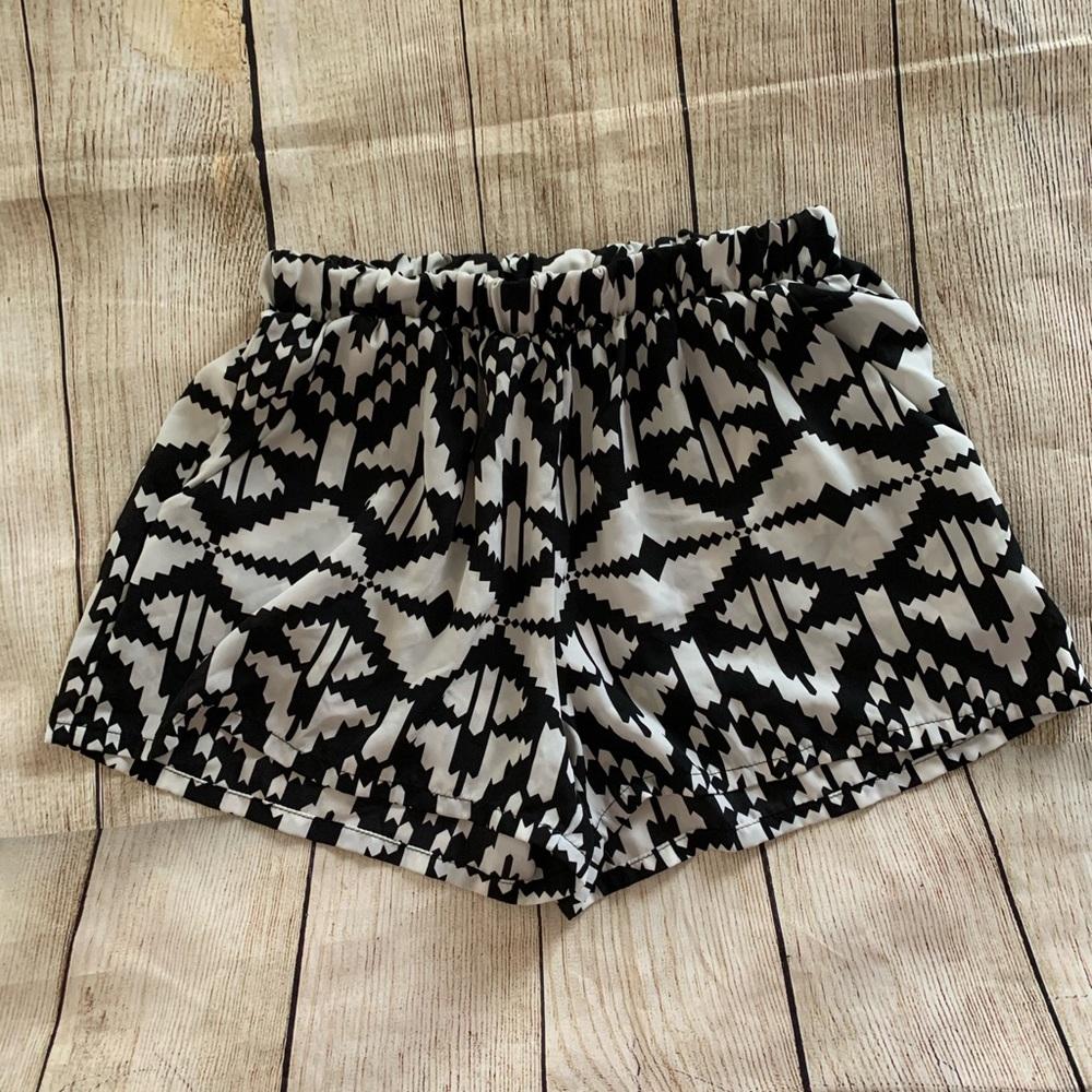 Black and cream colored shorts